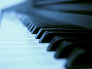 Blue soft light on piano keys